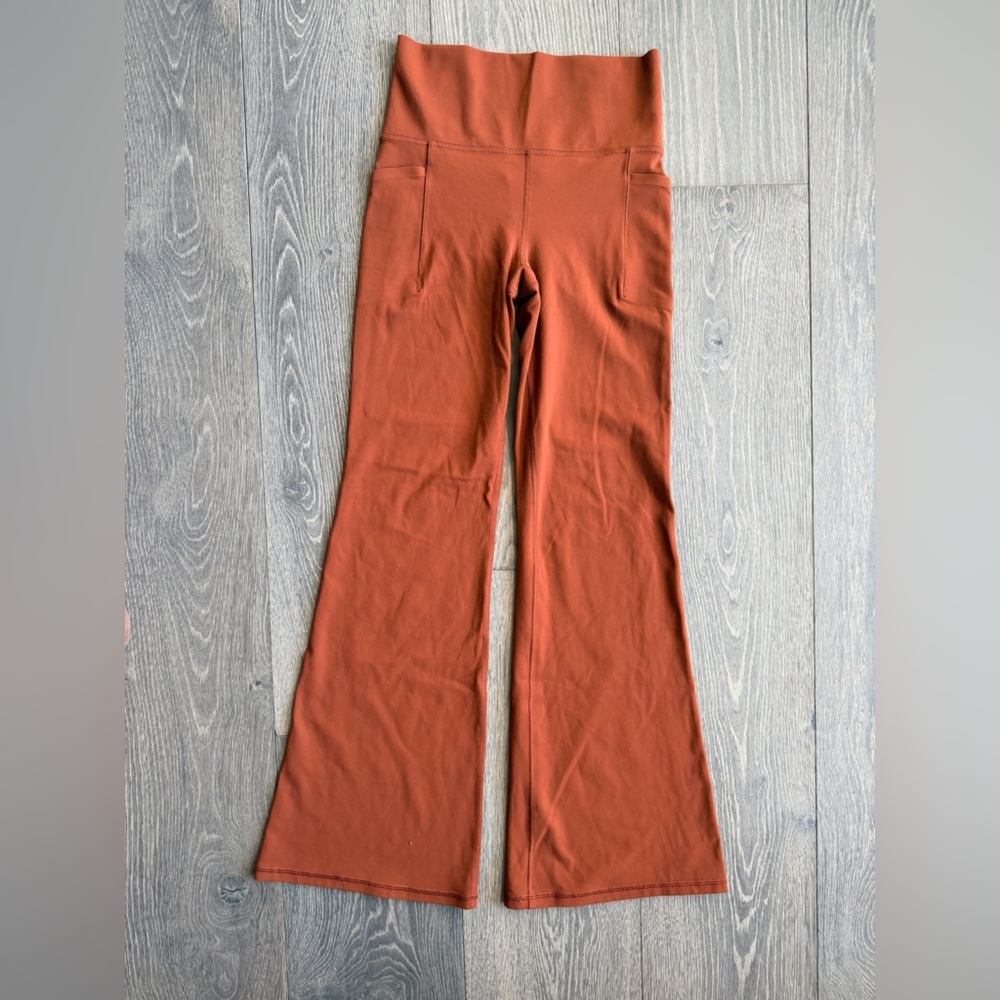 Athleta Salutation Stash Flare Pant in Brown Orange Size Small